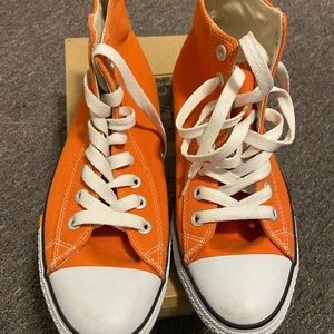 Levi’s edition orange chuck taylors